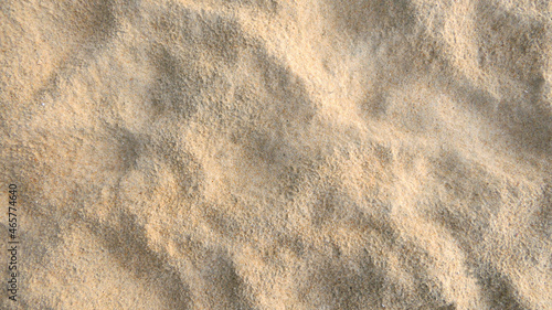 The texture of the sand when it is hit by rain water.