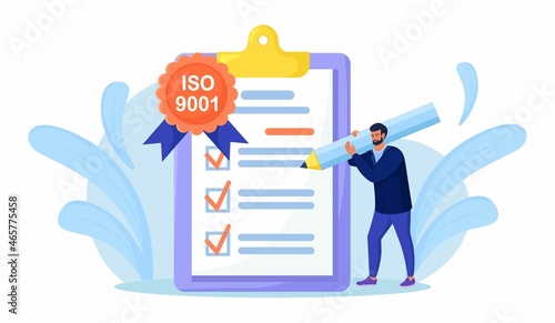 ISO 9001 quality management system, international certification. Businessman confirm, certify quality product in accordance with ISO 9001, standard quality control. Document standardization industry. 