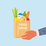 Volunteer holding a donation box with food for hunger people. Different grocery products for homeless people in shelter. Solidarity and charity concept. Vector design