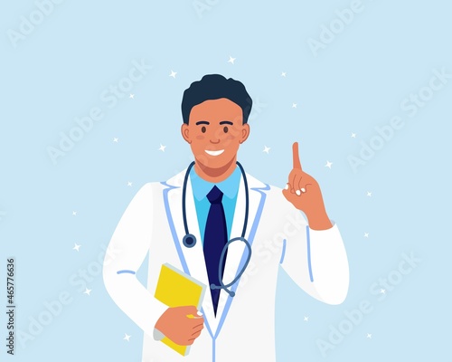 Doctor standing with pointing up with his forefinger. Happy smiling physician in medical gown showing finger up. Male character in white coat with phonendoscope, folder in hand. Vector illustration