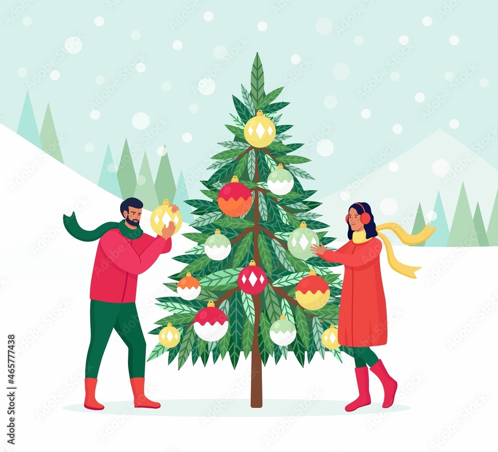 Couple Decorating Christmas Tree with Decorations Balls, Garland. Family Preparing for Celebration. Merry Christmas and Happy New Year. People Celebrate Winter Holidays. Man hanging toys on fir. Couple Decorating Christmas Tree with Decorations Balls, Garland. Family Preparing for Celebration. Merry Christmas and Happy New Year. People Celebrate Winter Holidays. Man hanging toys on fir.
