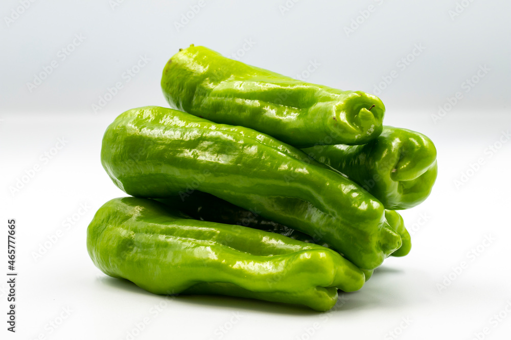 Cubanelle Peppers on white background with shadow. close up Cubanelle Peppers on white background with shadow. close up
