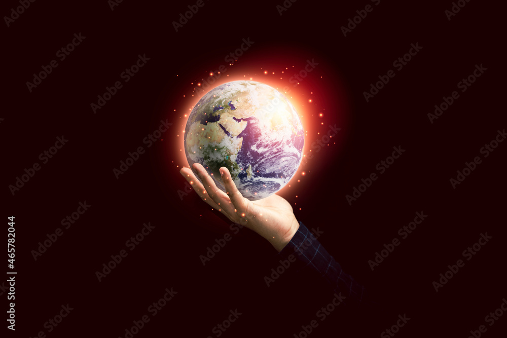 Hand holding planet for earth day and saving energy environment concept ,Element of this image from NASA and 3d render. Hand holding planet for earth day and saving energy environment concept ,Element of this image from NASA and 3d render.