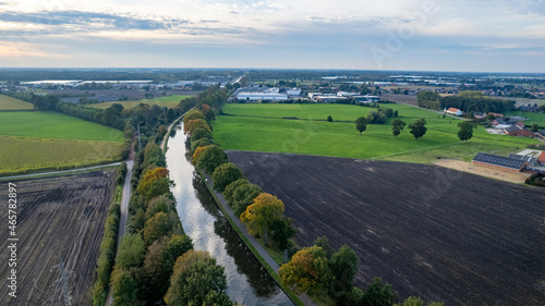 canal Dessel Schoten aerial photo in Rijkevorsel, kempen, Belgium, showing the waterway in the natural green agricultural landscape. High quality photo