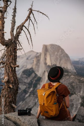 girl overlooking half dome in Yosemite national park