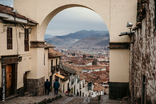 view through old arch in cusco Peru old town