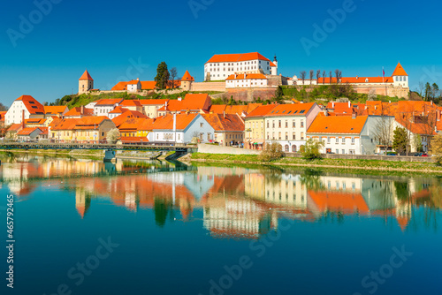 Picturesque European town reflected in the water. Ptuj, Slovenia