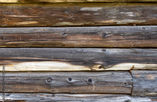 Background from old wooden boards with an interesting texture. Textured wood pattern. Photos of boards fitted to each other.