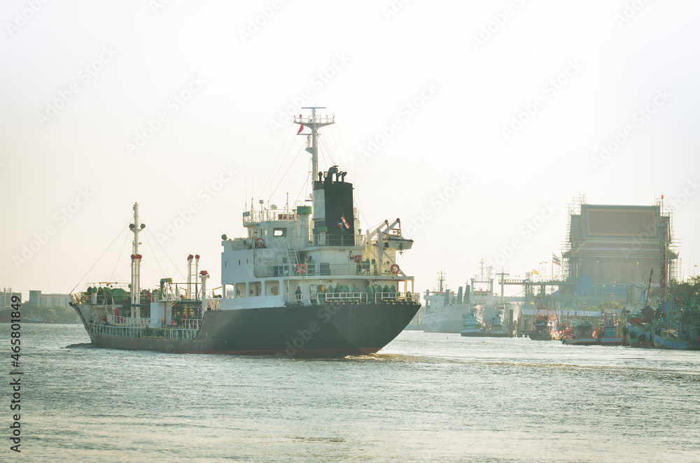 Fuel tanker was sailing in the estuary of the sea in the morning. Fuel tanker was sailing in the estuary of the sea in the morning.