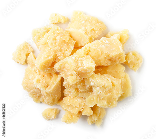 Parmesan cheese on a white background, isolated. Top view