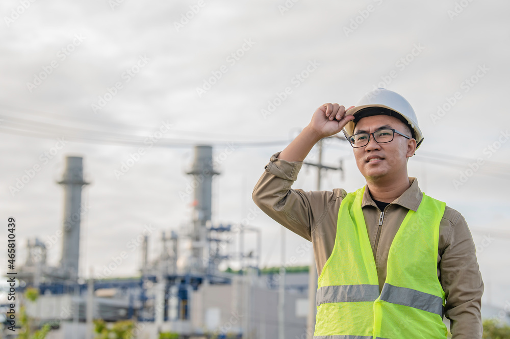 Asian man petrochemical engineer working at oil and gas refinery plant industry factory,The people worker man engineer work control at power plant energy industry manufacturing Asian man petrochemical engineer working at oil and gas refinery plant industry factory,The people worker man engineer work control at power plant energy industry manufacturing