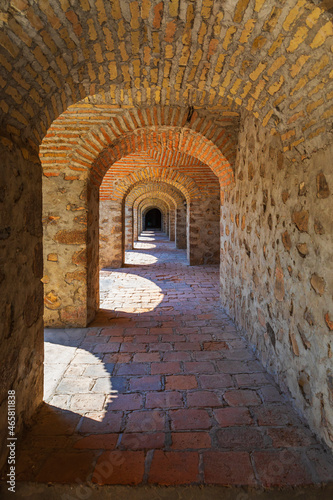 Arched ancient corridor in ...