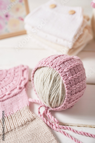 Knitted kids clothes and accessories for knitting. Needlework and knitting. Hobbies and creativity. Knit for children. Handmade © Aleksandr
