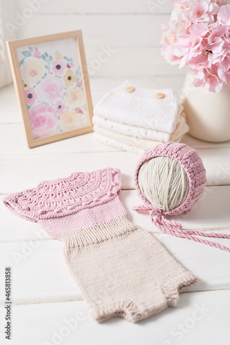 Knitted kids clothes and accessories for knitting. Needlework and knitting. Hobbies and creativity. Knit for children. Handmade