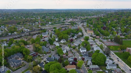 West Newton and Interstate Highway 90 I-90 aerial view at Exit 125 with Boston modern skyline at the background in city of Newton, Massachusetts MA, USA.  photo