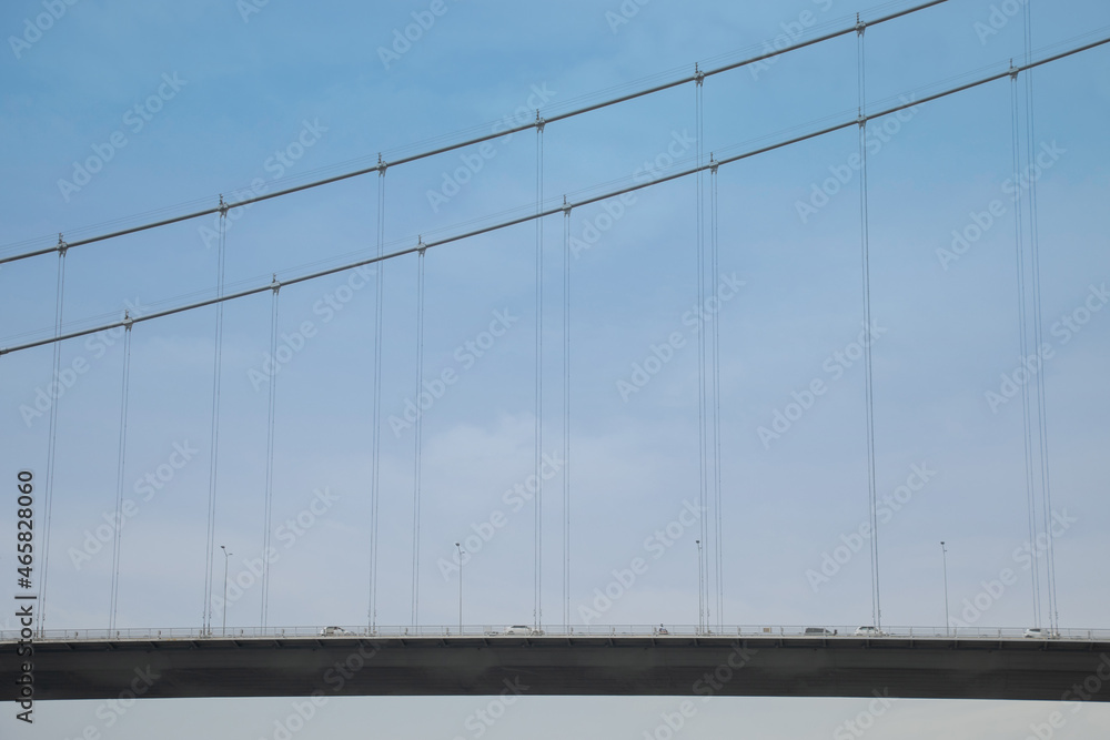 car cable-stayed bridge against a blue sky