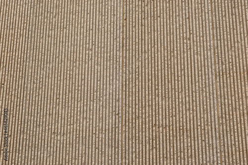 stone slab facade with carved stripes