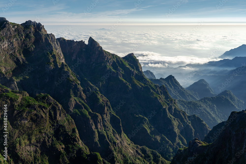The hiking trail with plenty of clouds starting from Pico do Arieiro and ending in Pico Ruivo (Parque de Estacionamento, Madeira, Portugal). The hiking trail with plenty of clouds starting from Pico do Arieiro and ending in Pico Ruivo (Parque de Estacionamento, Madeira, Portugal).