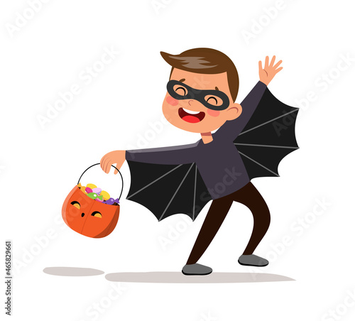Vector cartoon halloween batman boy with pumpkin