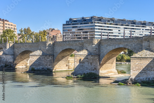 Zaragoza, Spain - 23 Oct, 2021:Puente de Piedra bridge across the river Ebro in the Spanish city Zaragoza