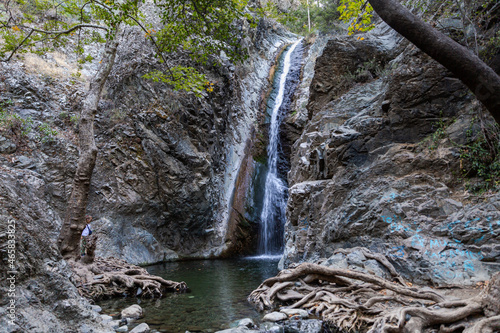 Walking to the waterfall on the island of Cyprus. Forest in the mountains, sandy trails, summer landscape. Mountain waterfalls in Cyprus. Caledonia and Millomeris.