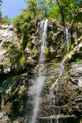 Walking to the waterfall on the island of Cyprus. Forest in the mountains, sandy trails, summer landscape. Mountain waterfalls in Cyprus. Caledonia and Millomeris.