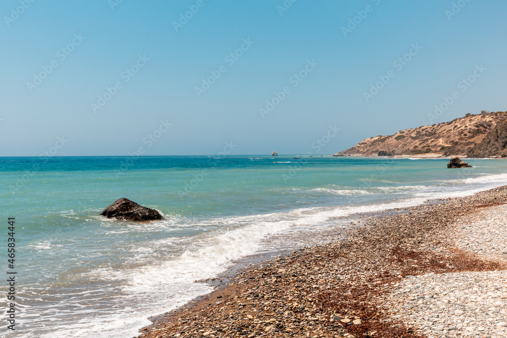 Seascape on the Mediterranean coast. Aphrodite's place. Myths and legends of ancient Greece. A wave on the sea. Sunny day at the sea. Soft light. Afrodita's rocks on Cyprus.