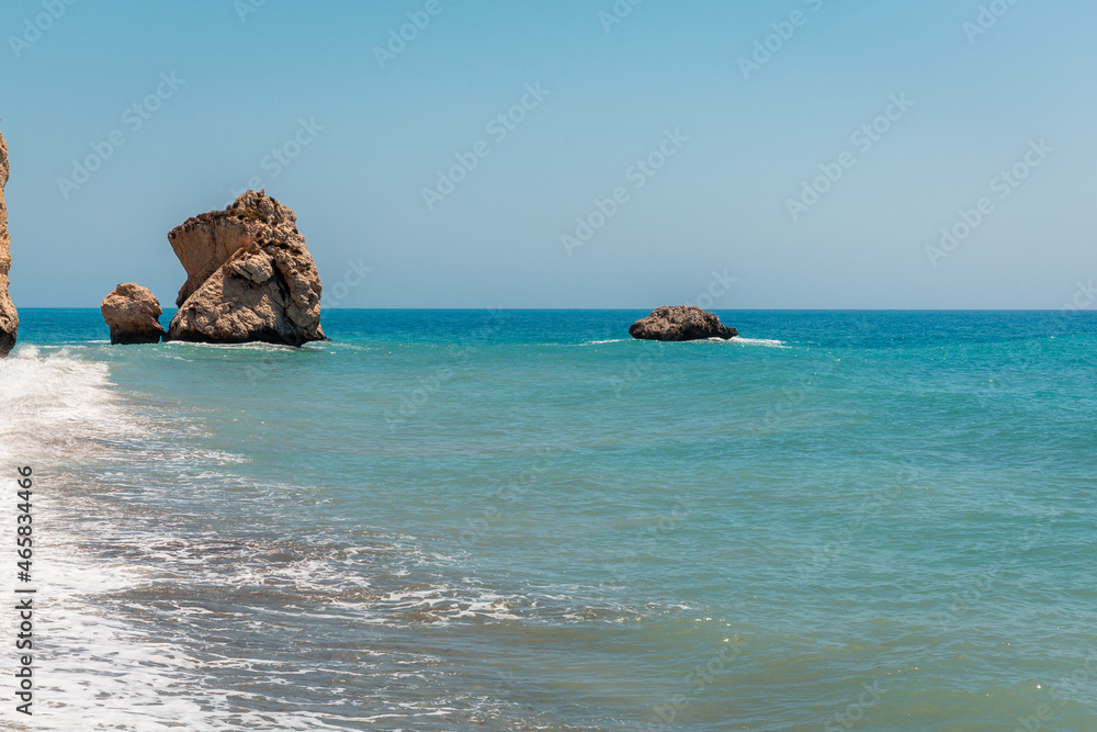 Seascape on the Mediterranean coast. Aphrodite's place. Myths and legends of ancient Greece. A wave on the sea. Sunny day at the sea. Soft light. Afrodita's rocks on Cyprus.