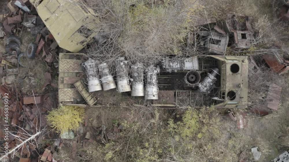 Aerial video. Old abandoned equipment that took part in the elimination of the accident. The village of Rassokha. Chernobyl. Rusty machinery. Aerial video. Old abandoned equipment that took part in the elimination of the accident. The village of Rassokha. Chernobyl. Rusty machinery.