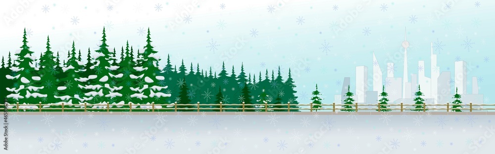 Fototapeta premium Winter landscape with a snowy forest and a silhouette of a big city.