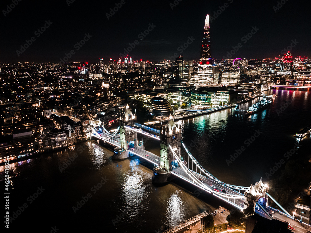 Stunning panorama view over Thames river in night the Shard, the London skyline, Tower Bridge and cityscape. Aerial photo over the big city at night