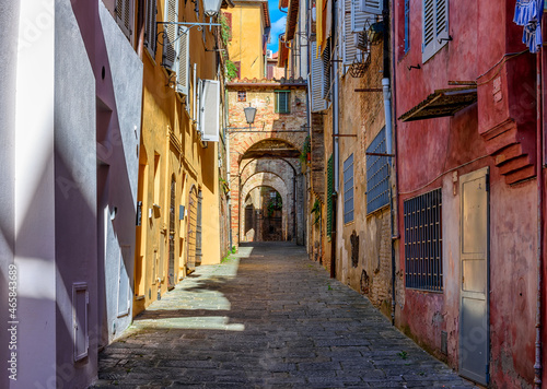 Medieval narrow street in Siena  Tuscany  Italy. Architecture and landmark of Siena. Cozy cityscape of Siena