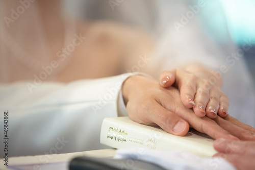 close up of a person holding a ring