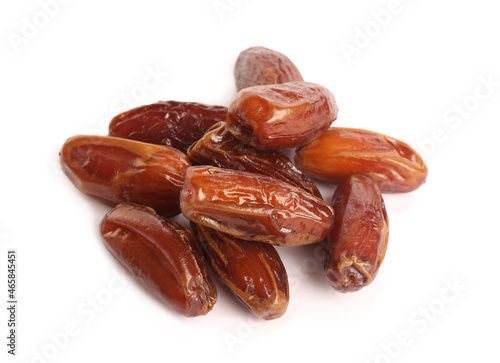 Heap of tasty sweet dried dates on white background