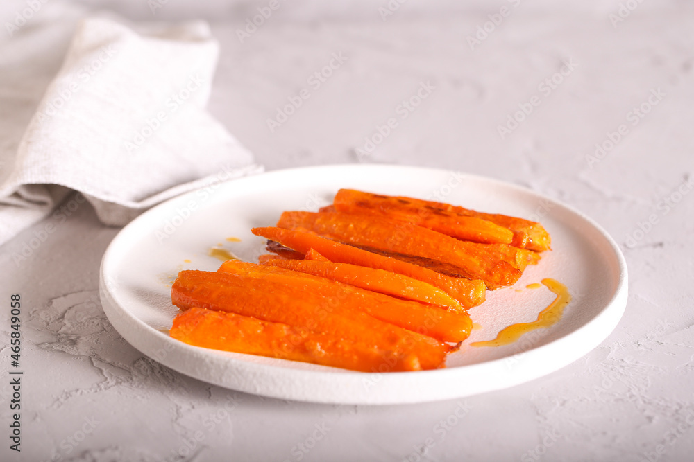 carrots baked in the oven are on the table carrots baked in the oven are on the table