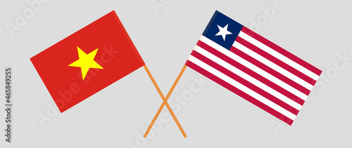 Crossed flags of Vietnam and Liberia. Official colors. Correct proportion