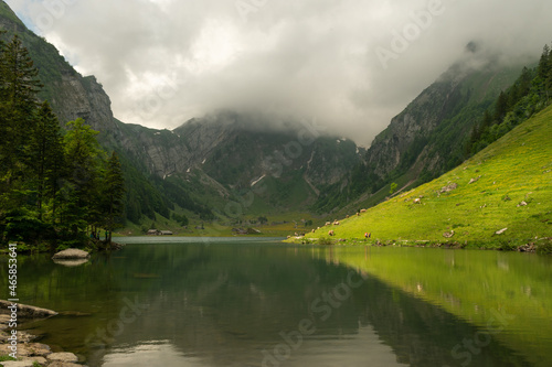 Appenzell, Switzerland, June 13, 2021 Idyllic lake Seealpsee in front of the alps