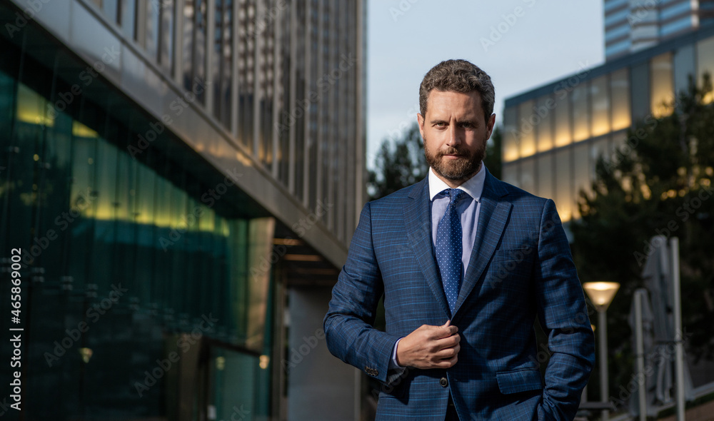 Fototapeta premium successful man in businesslike suit. manager executive outside the office. male formal fashion.