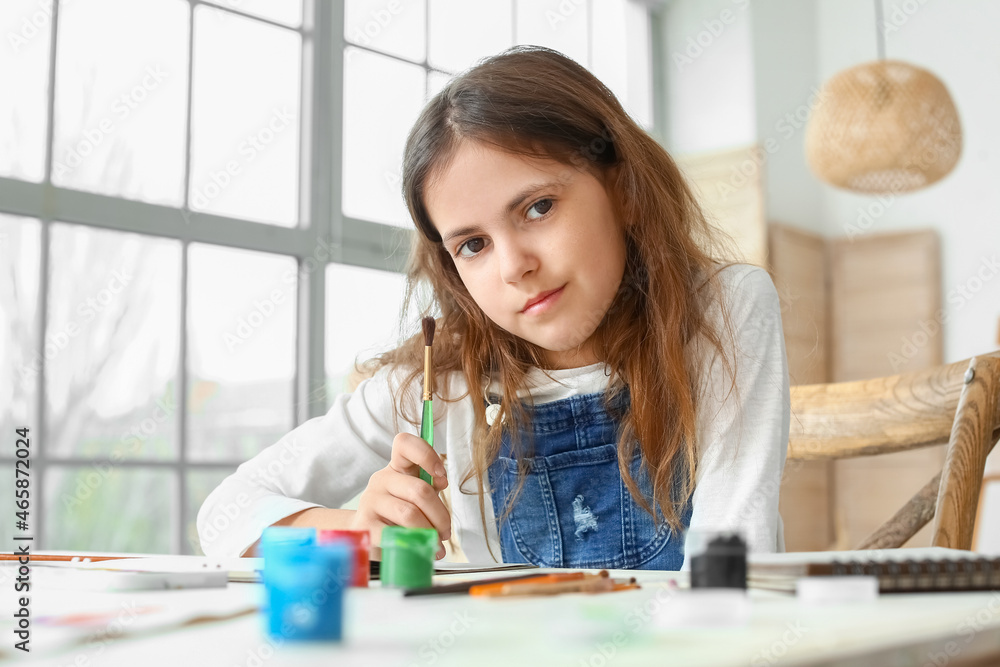 Cute little girl painting at home Cute little girl painting at home