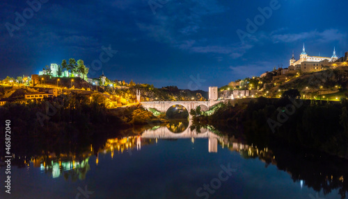 Night Panoramic view of the Alc  zar de Toledo and the Castillo de San Servando across the Alcantara Bridge