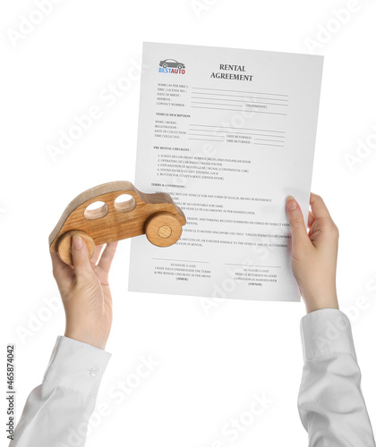 Woman holding rental agreem...