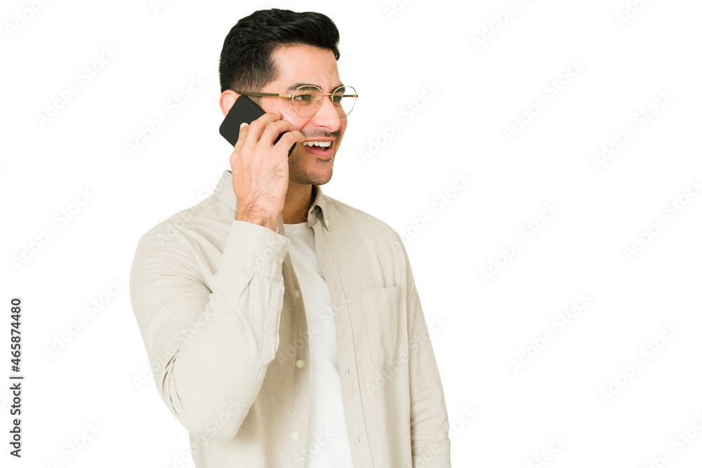 Handsome man making a call on his smartphone Handsome man making a call on his smartphone