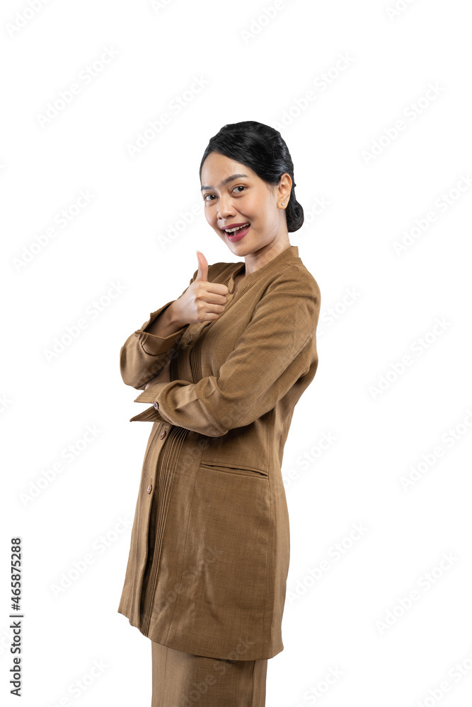 Smiling young civil servant woman standing with thumbs up Smiling young civil servant woman standing with thumbs up