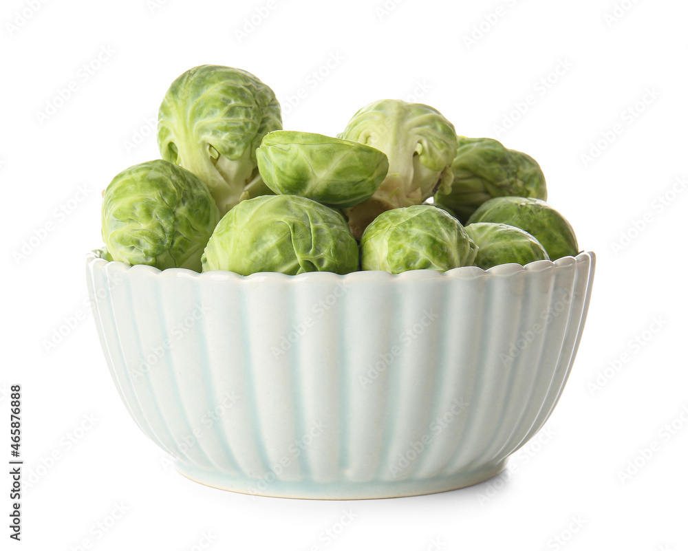 Fresh Brussels cabbage in bowl on white background Fresh Brussels cabbage in bowl on white background