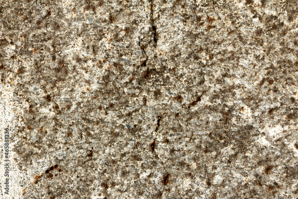 Texture and background of granite stone. granite is used for gravestones and memorials. Granite is a hard stone and requires skill to carve by hand. Texture and background of granite stone. granite is used for gravestones and memorials. Granite is a hard stone and requires skill to carve by hand.