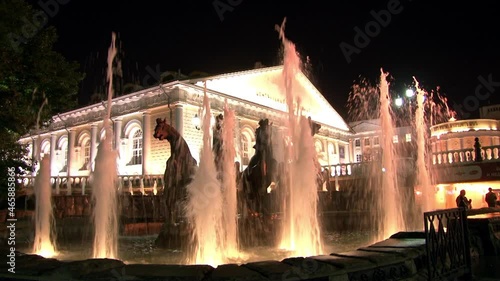 Historical Museum on Red Square of Moscow near walls of the Moscow Kremlin on background of black sky at night .