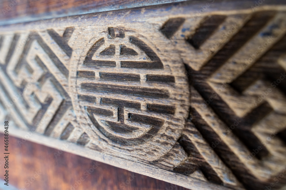 Carved patterns on ancient wooden doors