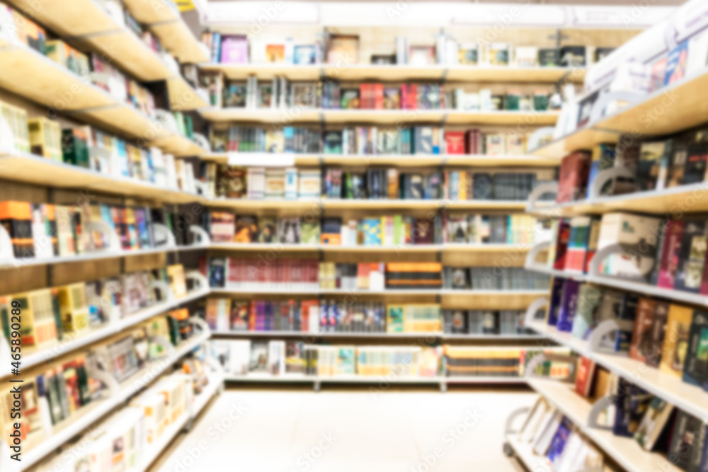 blurry bookstore shelves with books.
books and textbooks in the bookstore and in the library. Education and development. Love for reading.
