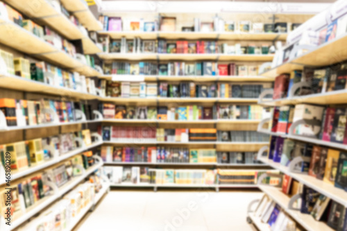 blurry bookstore shelves with books. books and textbooks in the bookstore and in the library. Education and development. Love for reading. 