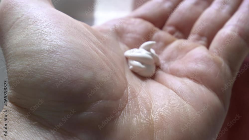 moisturizer being applied and rubbed into dry hands, 4K moisturizer being applied and rubbed into dry hands, 4K